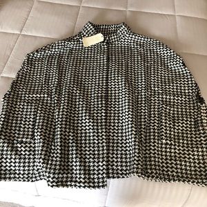 One size fit all shawl.  Brand new.